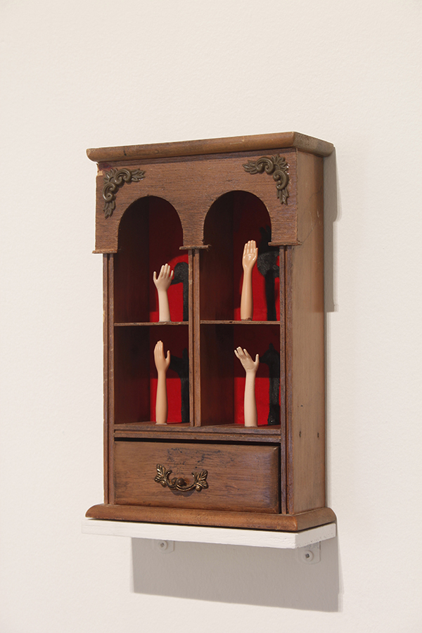 If You See Me - Advanced Fourth Year Studio Seminar Exhibition: Four Doll Arms on Shelves